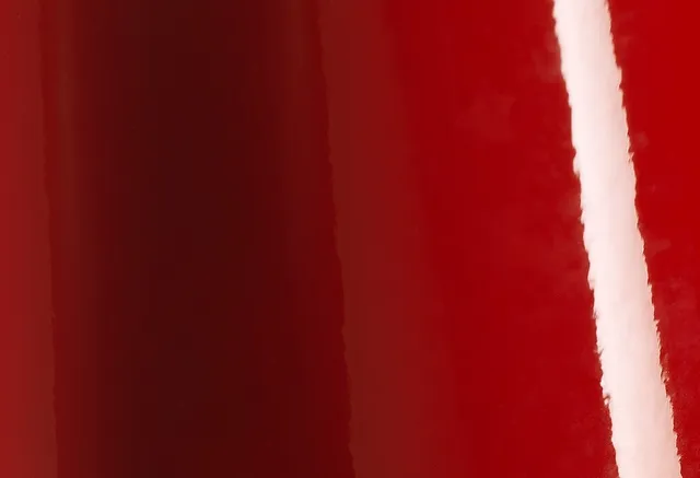 Avery Dennison Gloss Burgundy vinyl wrap film texture · Specced