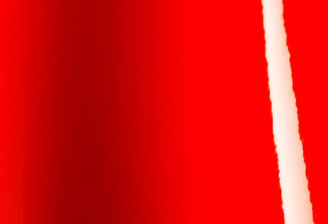Avery Dennison Gloss Cardinal Red vinyl wrap film texture · Specced