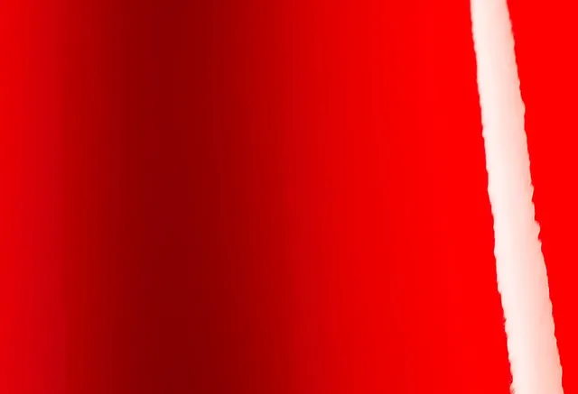 Avery Dennison Gloss Carmine Red vinyl wrap film texture · Specced