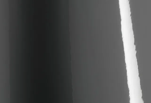 Avery Dennison Gloss Dark Grey vinyl wrap film texture · Specced