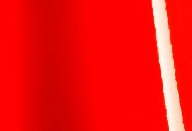 Avery Dennison Gloss Red vinyl wrap film texture · Specced