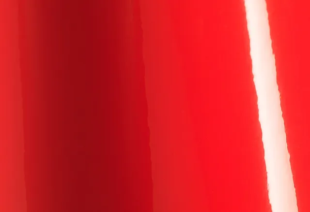 Avery Dennison Gloss Soft Red vinyl wrap film texture · Specced