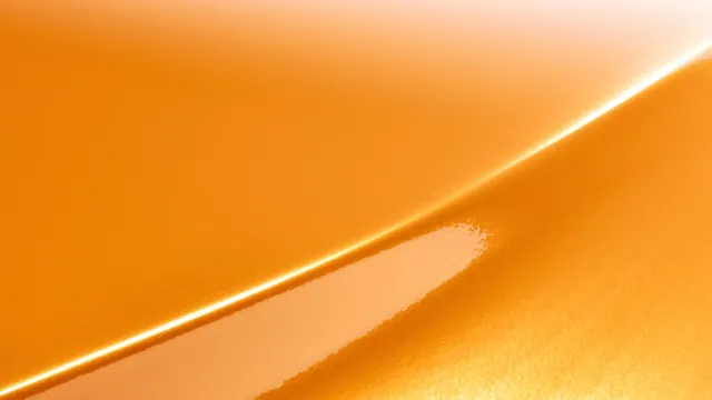 3M Gloss Bright Orange vinyl wrap film texture · Specced